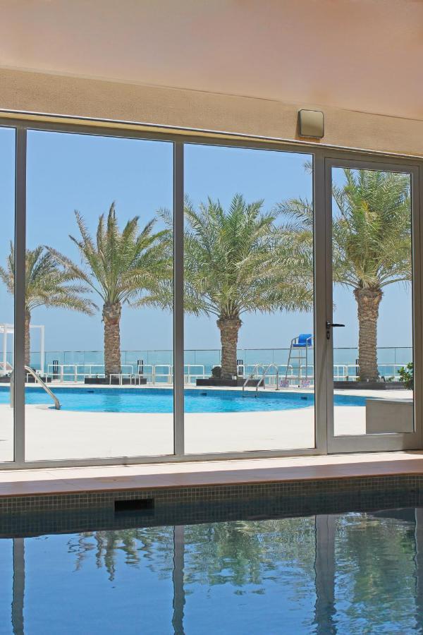 Grand Swiss-Belhotel Waterfront Seef Sanabis Exterior photo